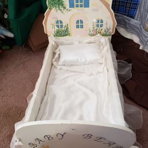 Doll and bed